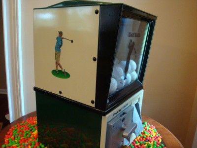 This is an all original VINTAGE VICTOR GOLF BALL VENDING MACHINE that 